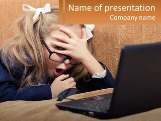 Schoolgirl At Laptop PowerPoint Template
