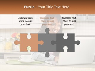 Girl At The Laptop In The Kitchen PowerPoint Template