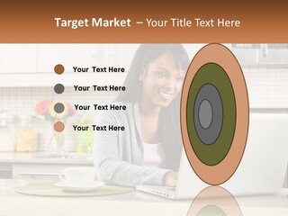 Girl At The Laptop In The Kitchen PowerPoint Template