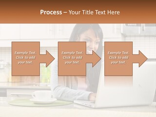 Girl At The Laptop In The Kitchen PowerPoint Template