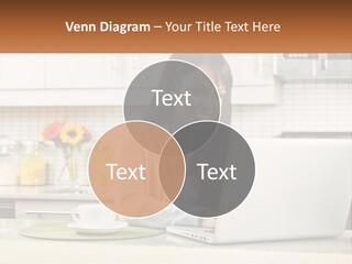 Girl At The Laptop In The Kitchen PowerPoint Template