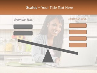 Girl At The Laptop In The Kitchen PowerPoint Template