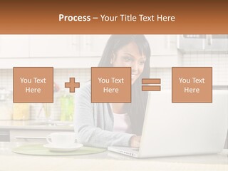 Girl At The Laptop In The Kitchen PowerPoint Template