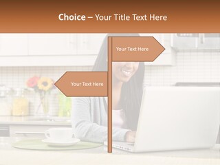 Girl At The Laptop In The Kitchen PowerPoint Template