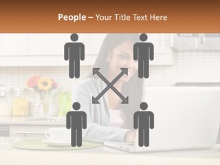 Girl At The Laptop In The Kitchen PowerPoint Template