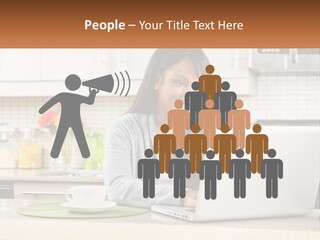 Girl At The Laptop In The Kitchen PowerPoint Template