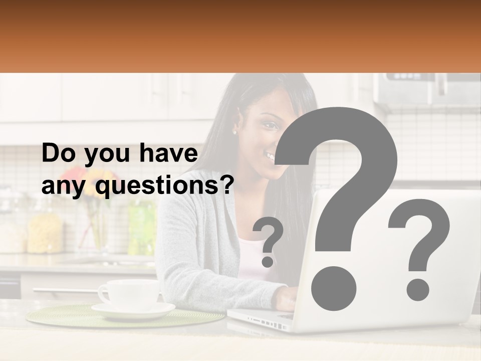 Girl At The Laptop In The Kitchen PowerPoint Template