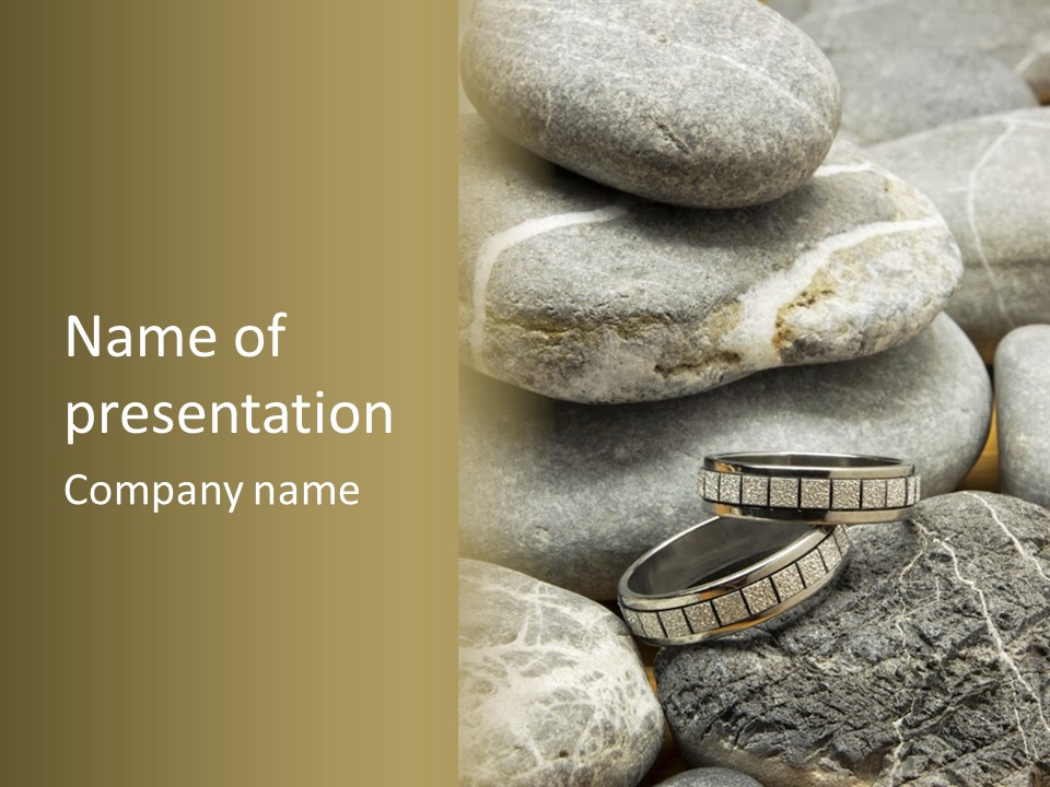 Two Wedding Rings On The Stones PowerPoint Template