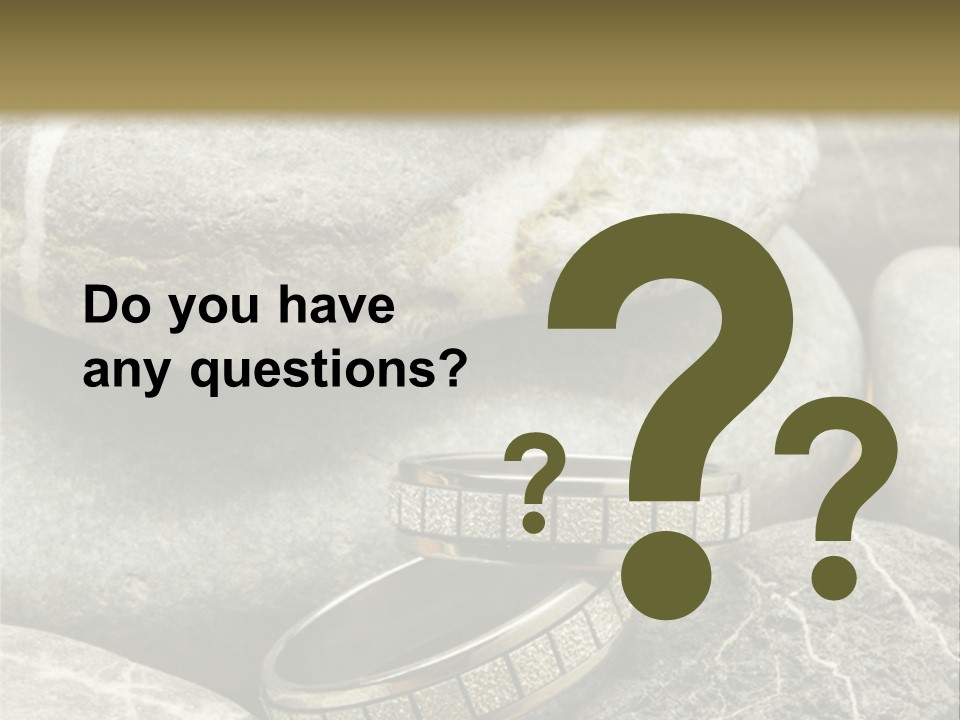 Two Wedding Rings On The Stones PowerPoint Template