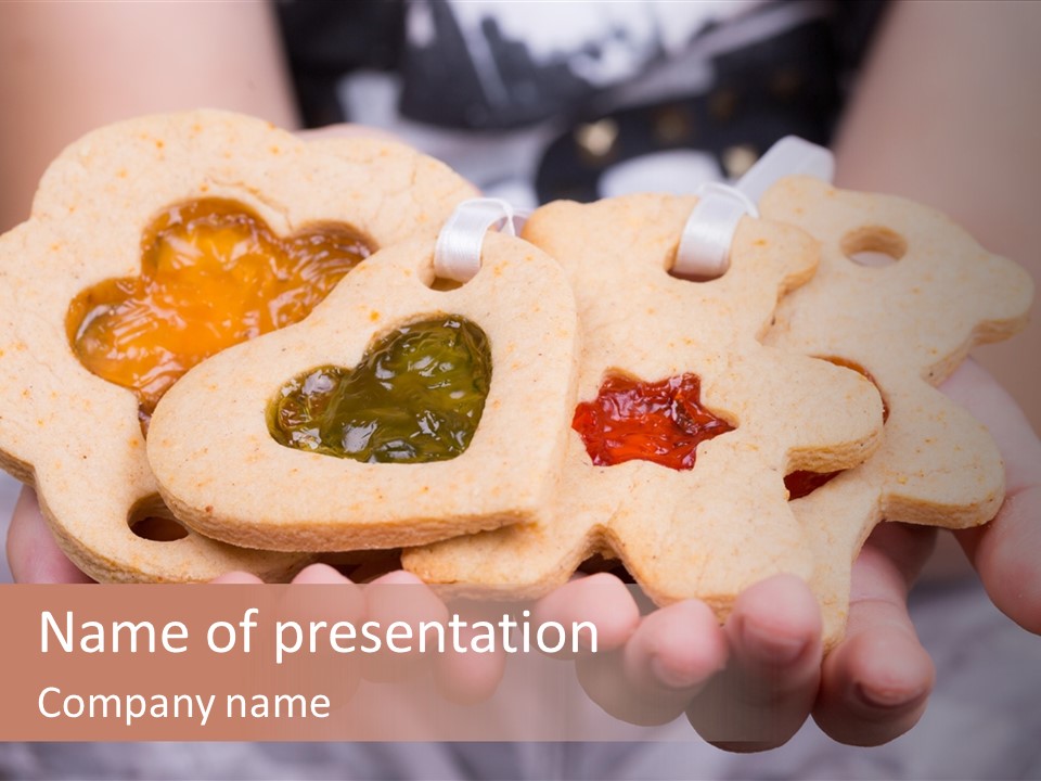 Set Of Cookies In Baby Hands PowerPoint Template