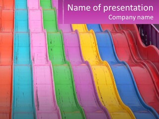 A Bunch Of Colorful Plastic Chairs In A Row PowerPoint Template