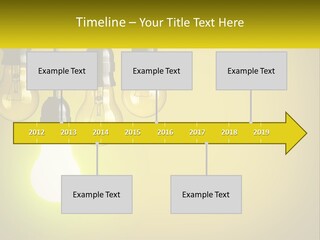 A Group Of Light Bulbs Hanging From A Ceiling PowerPoint Template