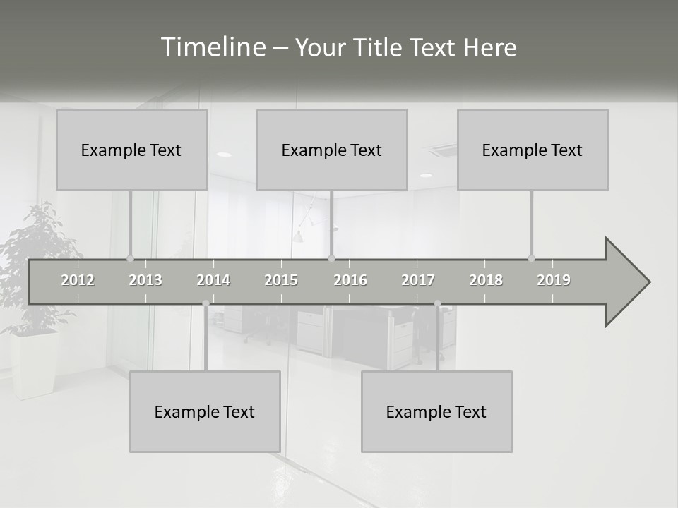 An Office With Glass Walls And A Plant In The Middle PowerPoint Template