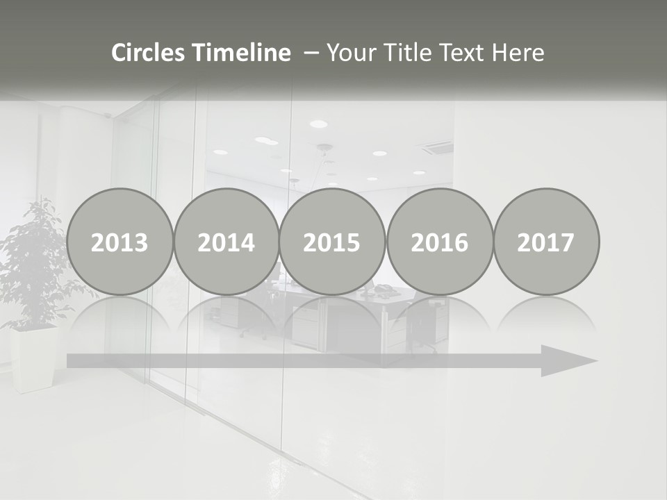 An Office With Glass Walls And A Plant In The Middle PowerPoint Template