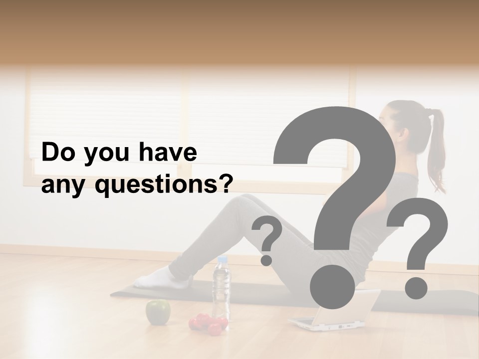 A Woman Sitting On The Floor Using A Laptop Computer PowerPoint Template