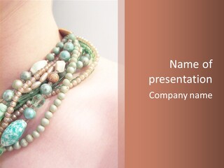 A Woman Wearing A Green And White Beaded Necklace PowerPoint Template