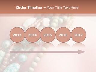 A Woman Wearing A Green And White Beaded Necklace PowerPoint Template