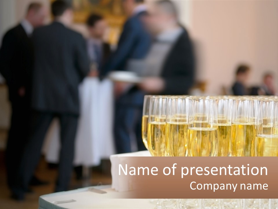 A Group Of People Standing Around A Table With Glasses Of Champagne PowerPoint Template