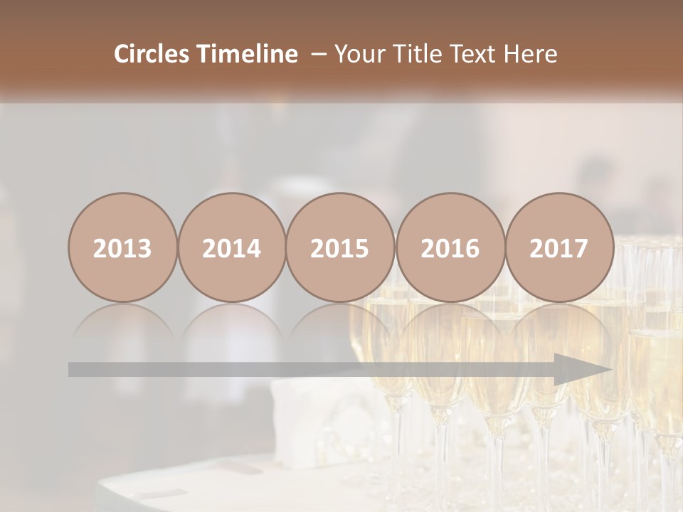 A Group Of People Standing Around A Table With Glasses Of Champagne PowerPoint Template