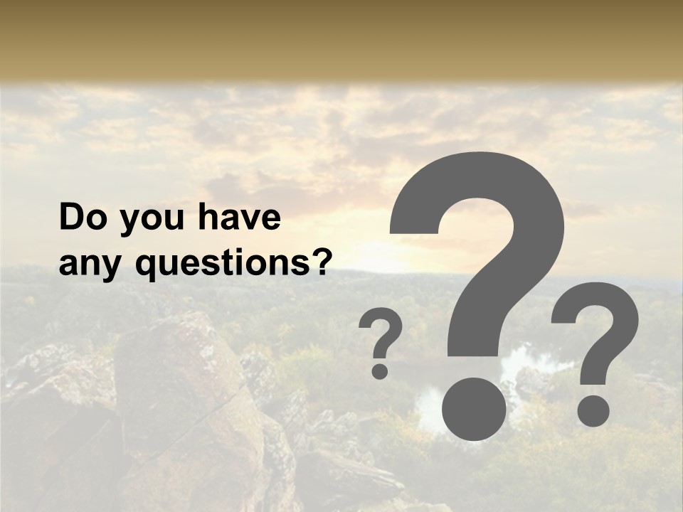 A Picture Of A Sunset Over Some Rocks PowerPoint Template