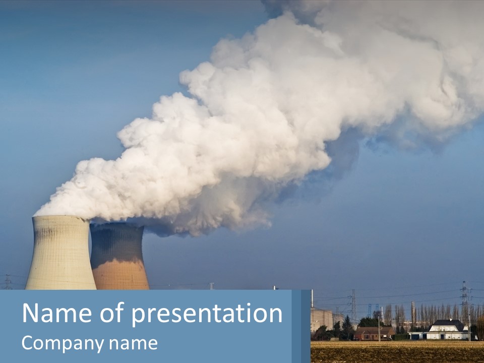 A Power Plant With Smoke Coming Out Of It PowerPoint Template