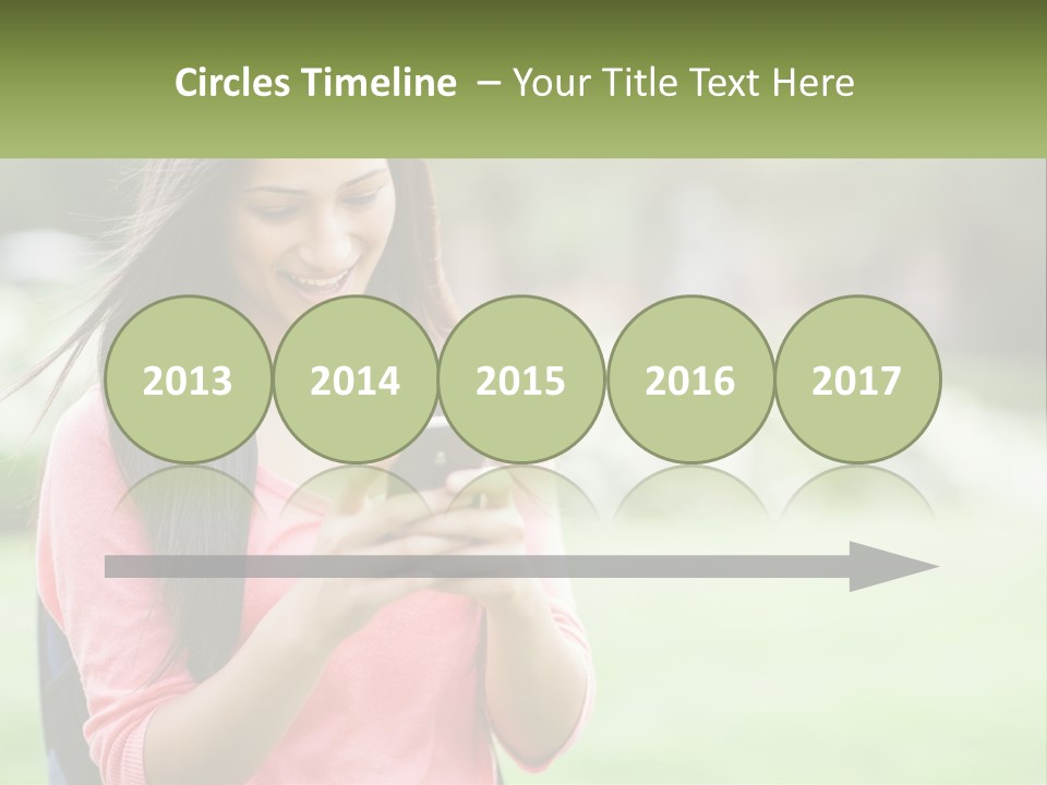 A Woman Holding A Cell Phone In Her Hands PowerPoint Template