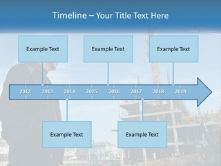 A Man Standing In Front Of A Construction Site PowerPoint Template