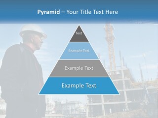 A Man Standing In Front Of A Construction Site PowerPoint Template