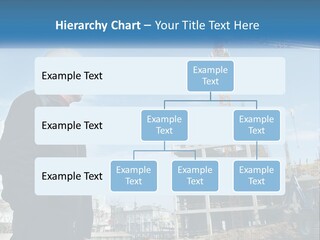 A Man Standing In Front Of A Construction Site PowerPoint Template