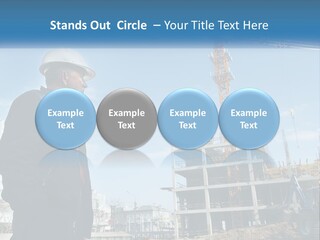 A Man Standing In Front Of A Construction Site PowerPoint Template