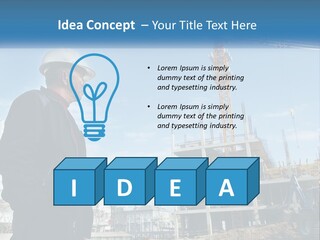 A Man Standing In Front Of A Construction Site PowerPoint Template