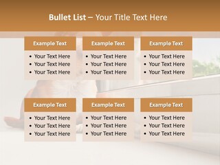 A Small Dog Is Looking Out Of A Window PowerPoint Template