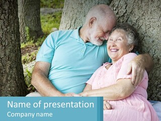 A Man And Woman Sitting Next To Each Other Under A Tree PowerPoint Template