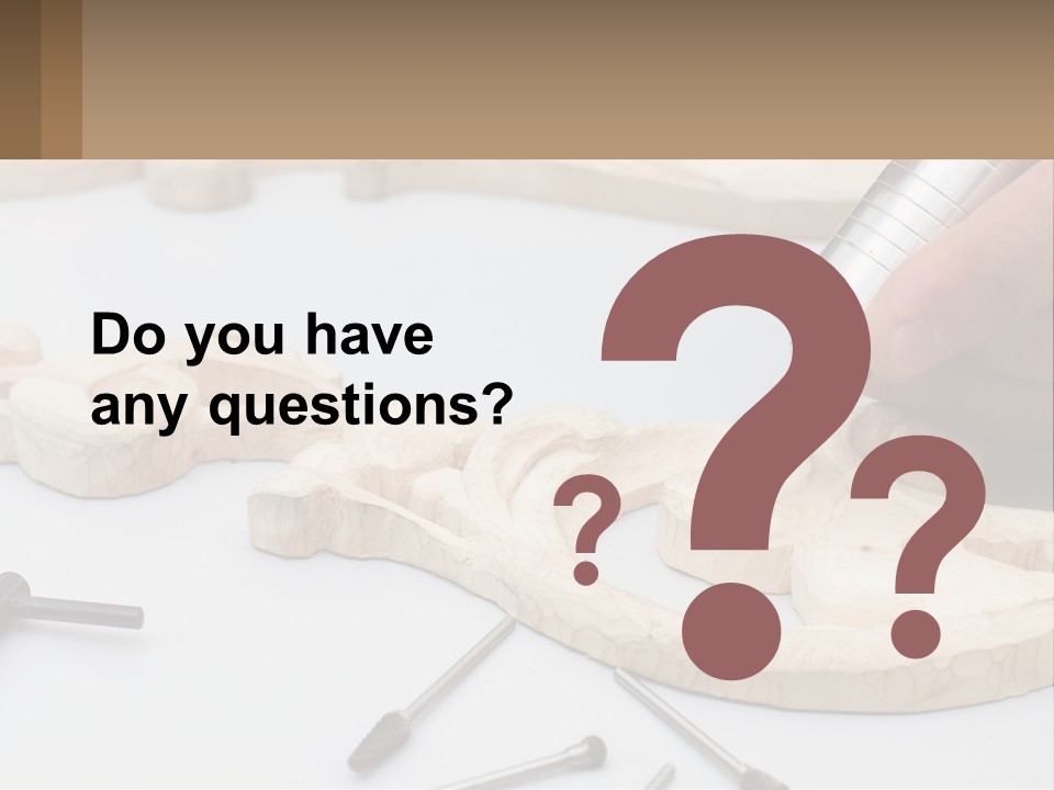 A Person Is Carving A Piece Of Wood With A Drill PowerPoint Template