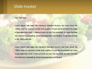 A Salad With Cucumbers And Olives On A Plate PowerPoint Template