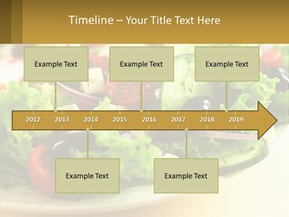 A Salad With Cucumbers And Olives On A Plate PowerPoint Template