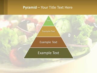 A Salad With Cucumbers And Olives On A Plate PowerPoint Template
