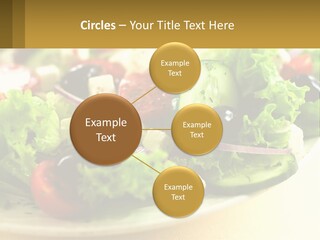A Salad With Cucumbers And Olives On A Plate PowerPoint Template
