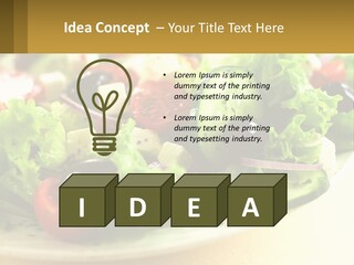 A Salad With Cucumbers And Olives On A Plate PowerPoint Template