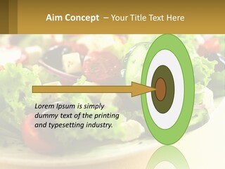 A Salad With Cucumbers And Olives On A Plate PowerPoint Template