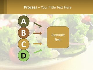 A Salad With Cucumbers And Olives On A Plate PowerPoint Template