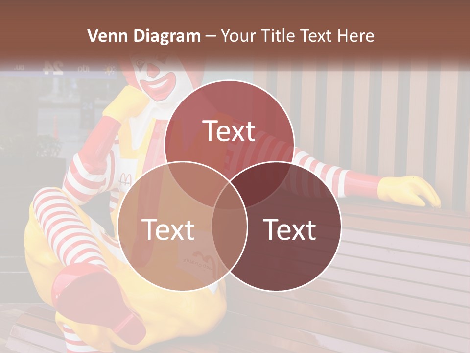 A Clown Sitting On A Bench In Front Of A Building PowerPoint Template