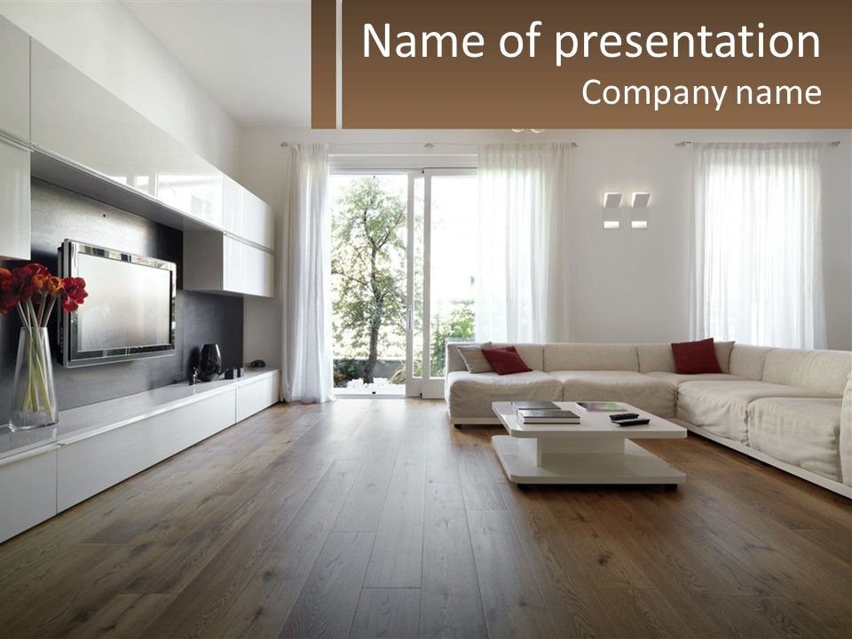 A Living Room With A Large White Couch PowerPoint Template