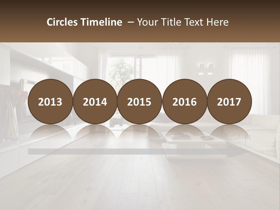 A Living Room With A Large White Couch PowerPoint Template