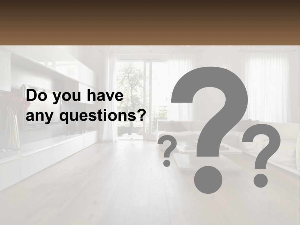 A Living Room With A Large White Couch PowerPoint Template