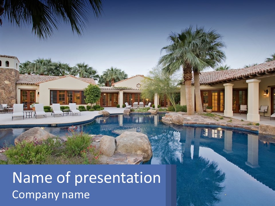 A Pool Surrounded By Palm Trees Next To A House PowerPoint Template