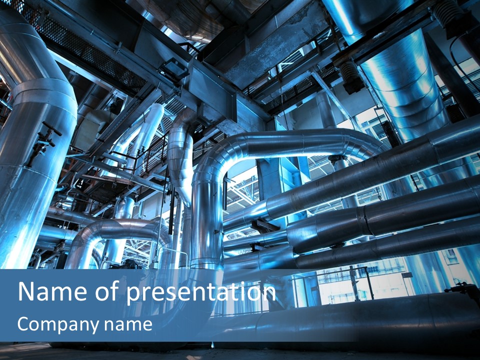 A Large Group Of Pipes In A Building PowerPoint Template