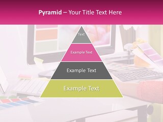 A Woman Sitting At A Desk Using A Computer PowerPoint Template