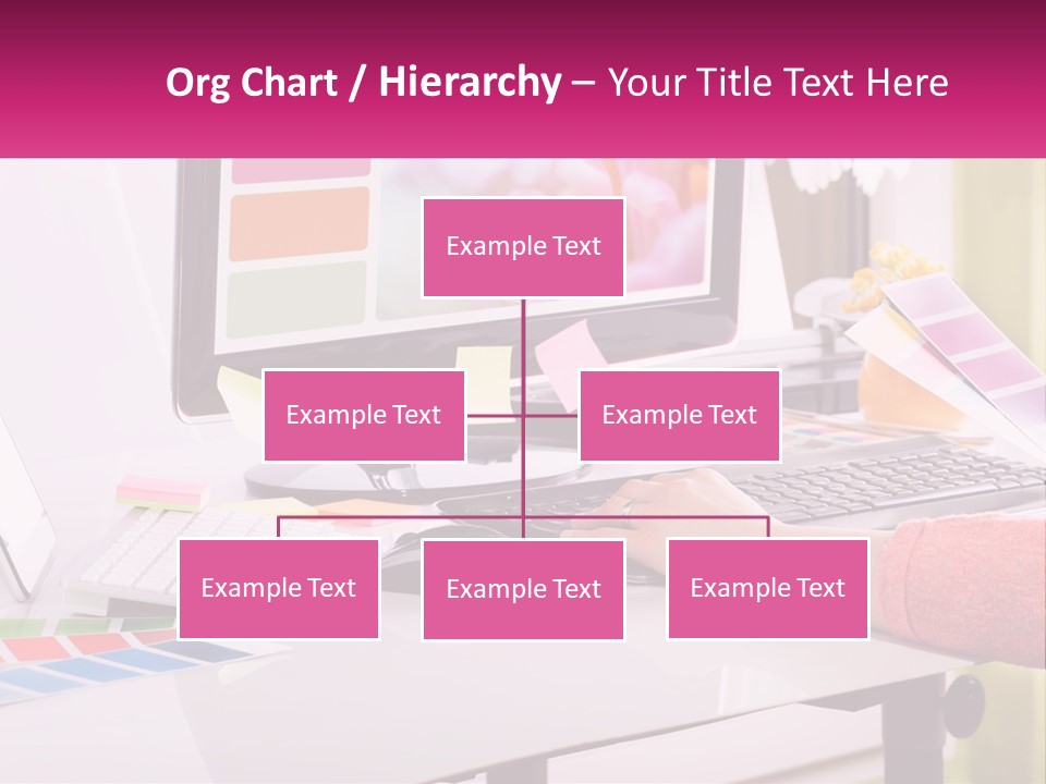 A Woman Sitting At A Desk Using A Computer PowerPoint Template