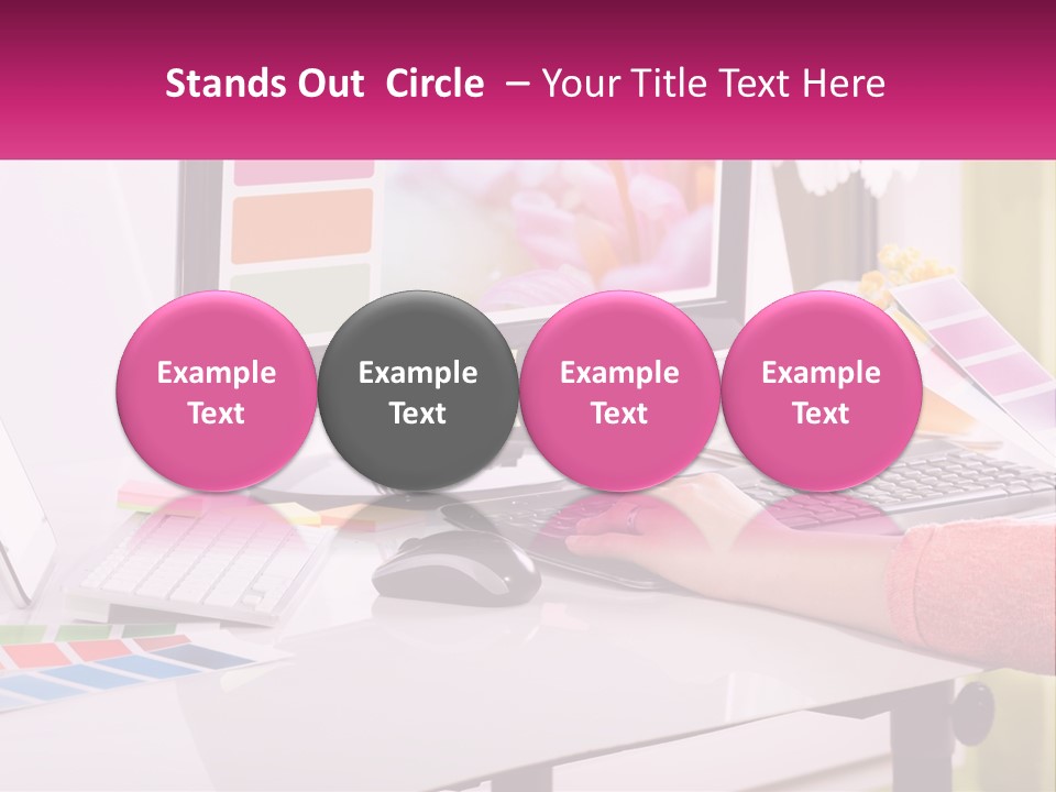 A Woman Sitting At A Desk Using A Computer PowerPoint Template